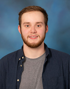 A headshot of Crosby