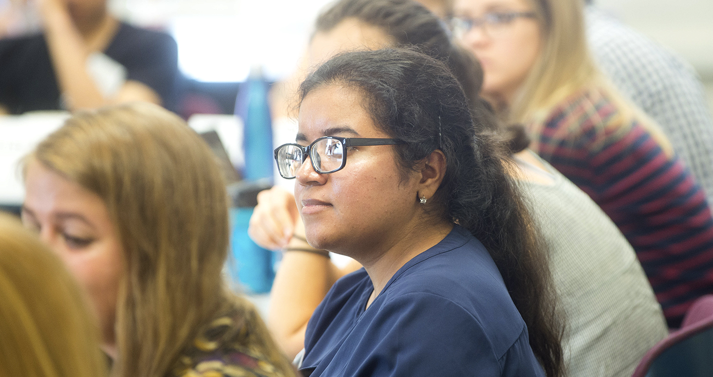 female students listening to lecture