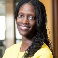 Kinloch in a yellow blouse