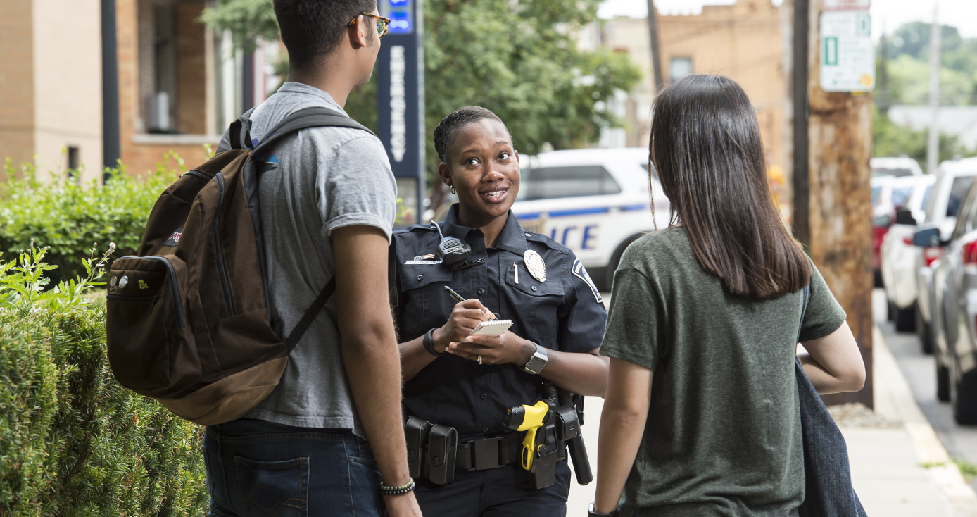 Pitt police officers speak to members of the Pitt community