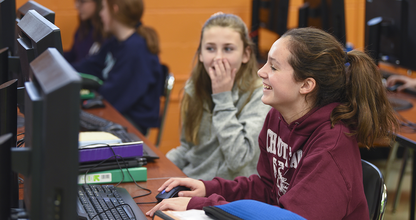 two female students working at computers