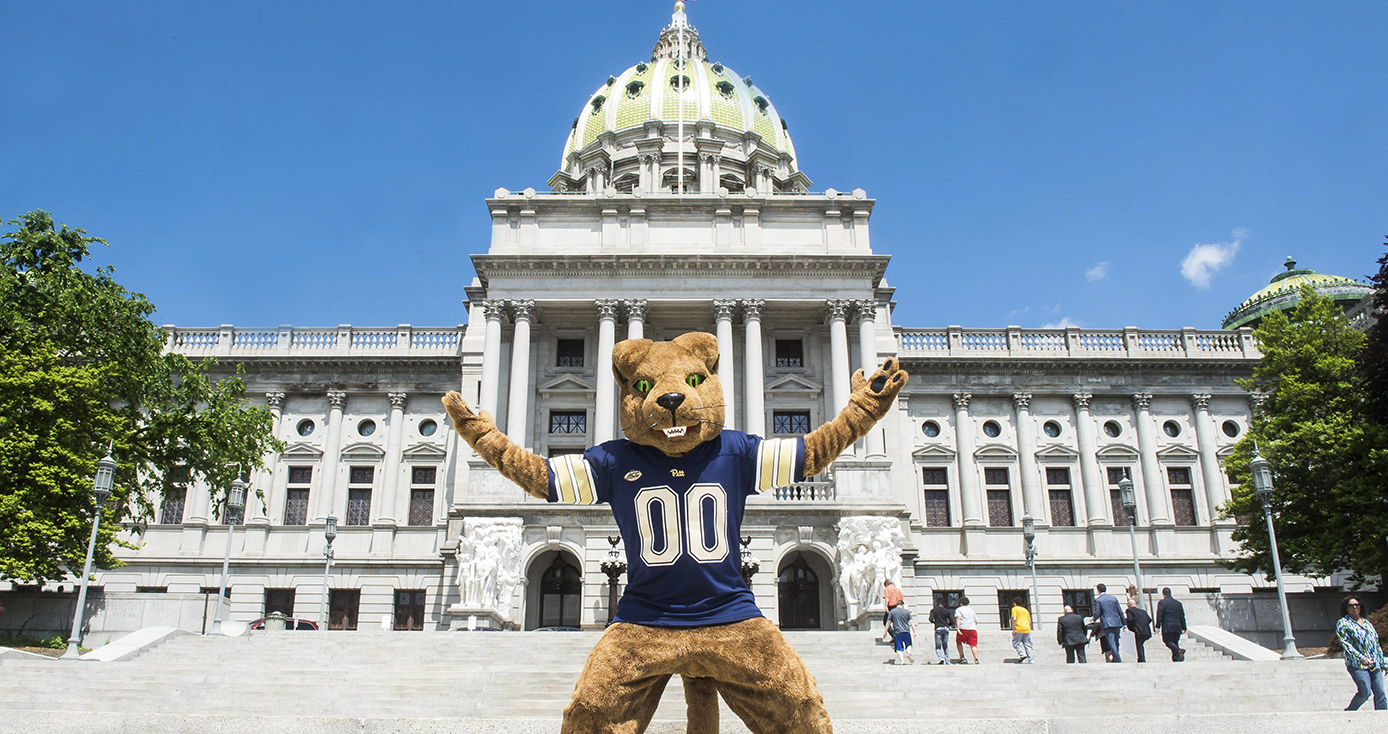 Roc in front of the Harrisburg capitol building.