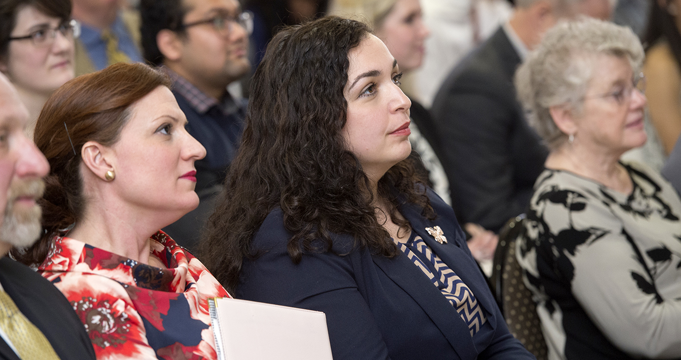 Vjosa Osmani sitting among audience members