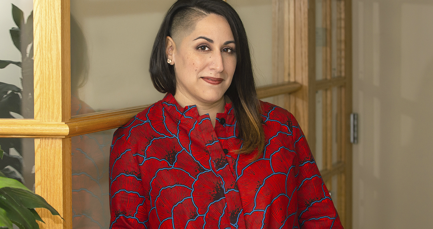 Carla Chugani in a red and blue patterned blouse 