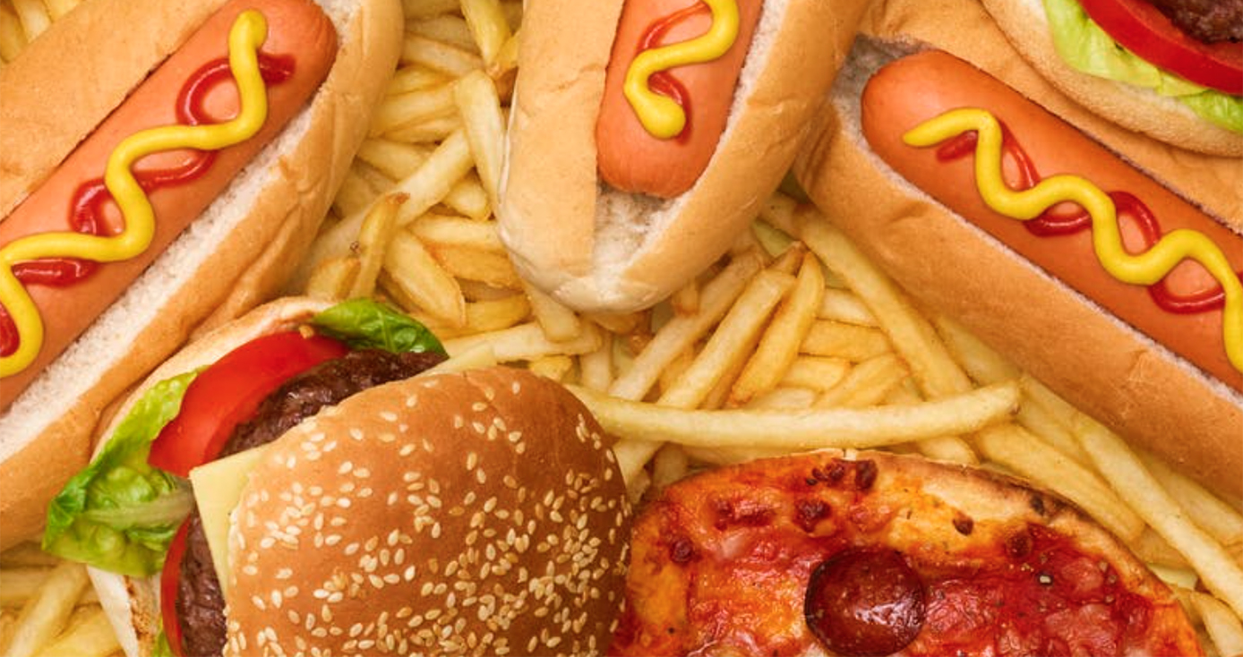 A variety of fast foods, including hamburgers, pizza, hot dogs and French fries