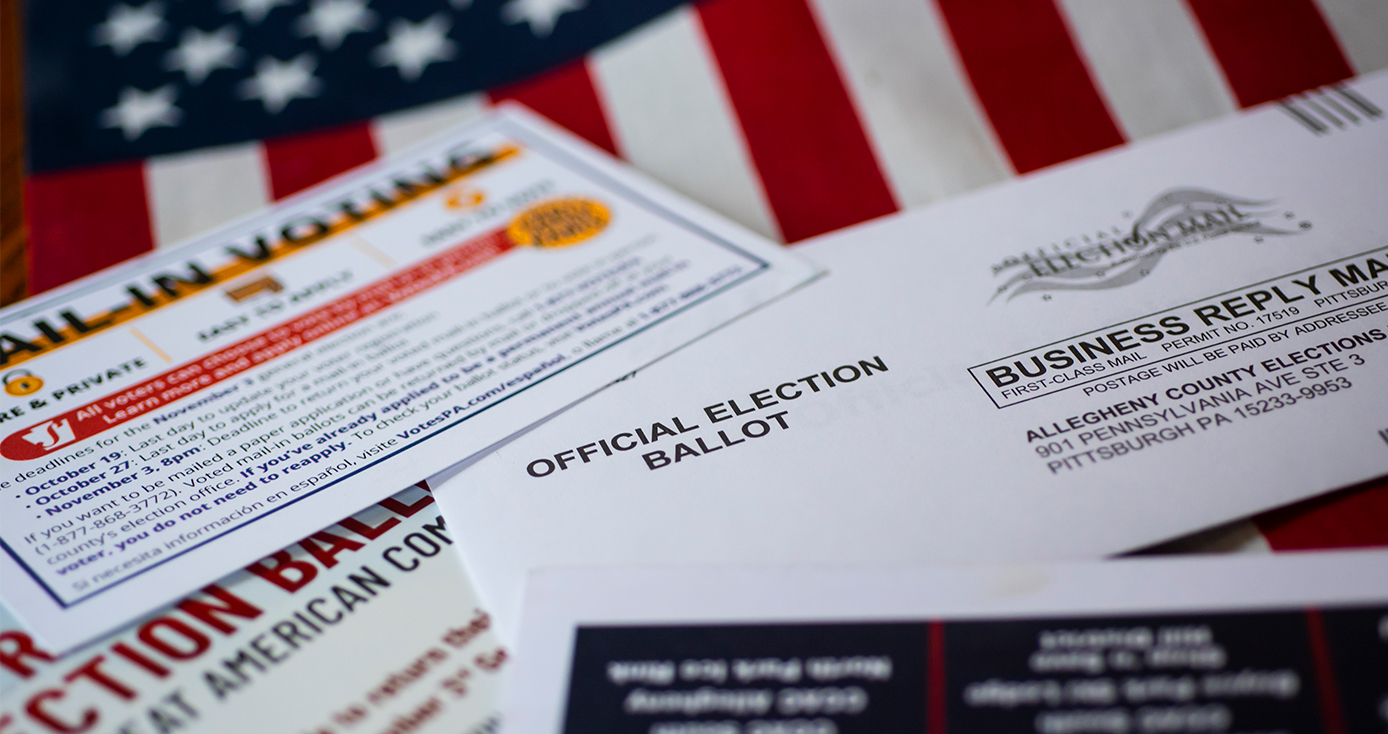 A ballot on an American flag