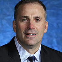 Narduzzi in a black suit jacket