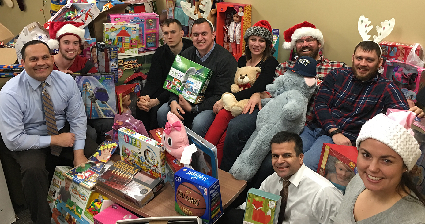 a group of vets surrounded by toys