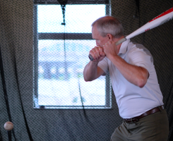 Clark swinging a bat