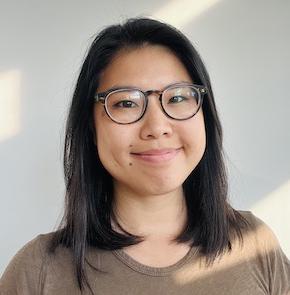 Headshot of woman wearing glasses.