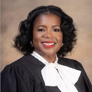 A black female judge in her formal attire